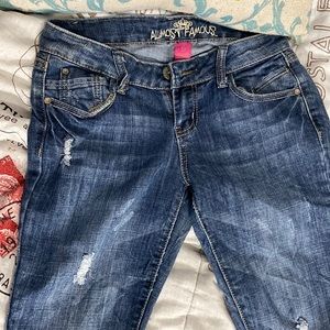 Almost Famous jeans with destress on the legs. Very cute jeans.